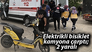 Elektrikli bisiklet kamyona çarptı; 2 yaralı